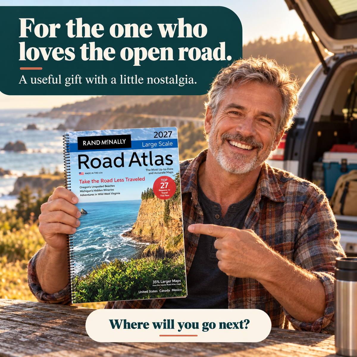 Road trip enthusiast holding the 2027 atlas as a useful travel gift