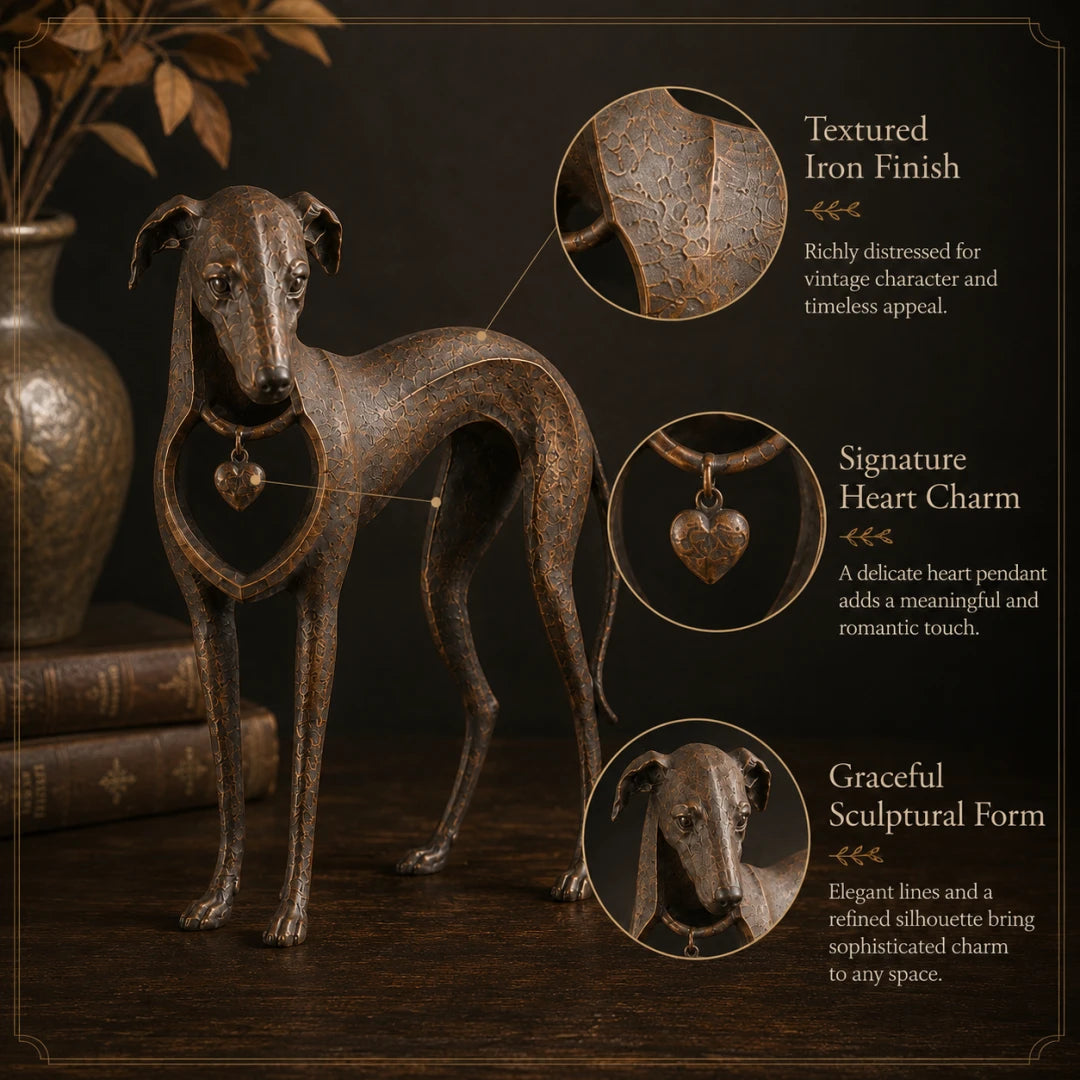 Heart charm detail on vintage sighthound sculpture