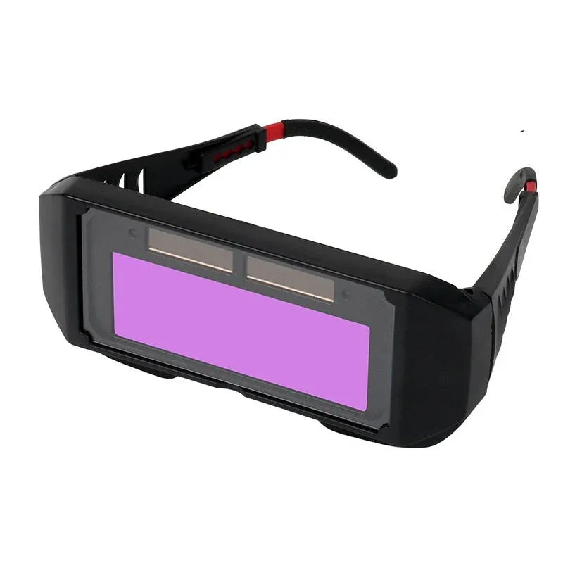 Auto-darkening welding goggles with wide lens and adjustable temples