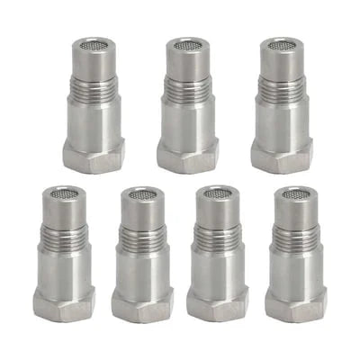 Seven stainless steel oxygen sensor spacer adapters arranged together