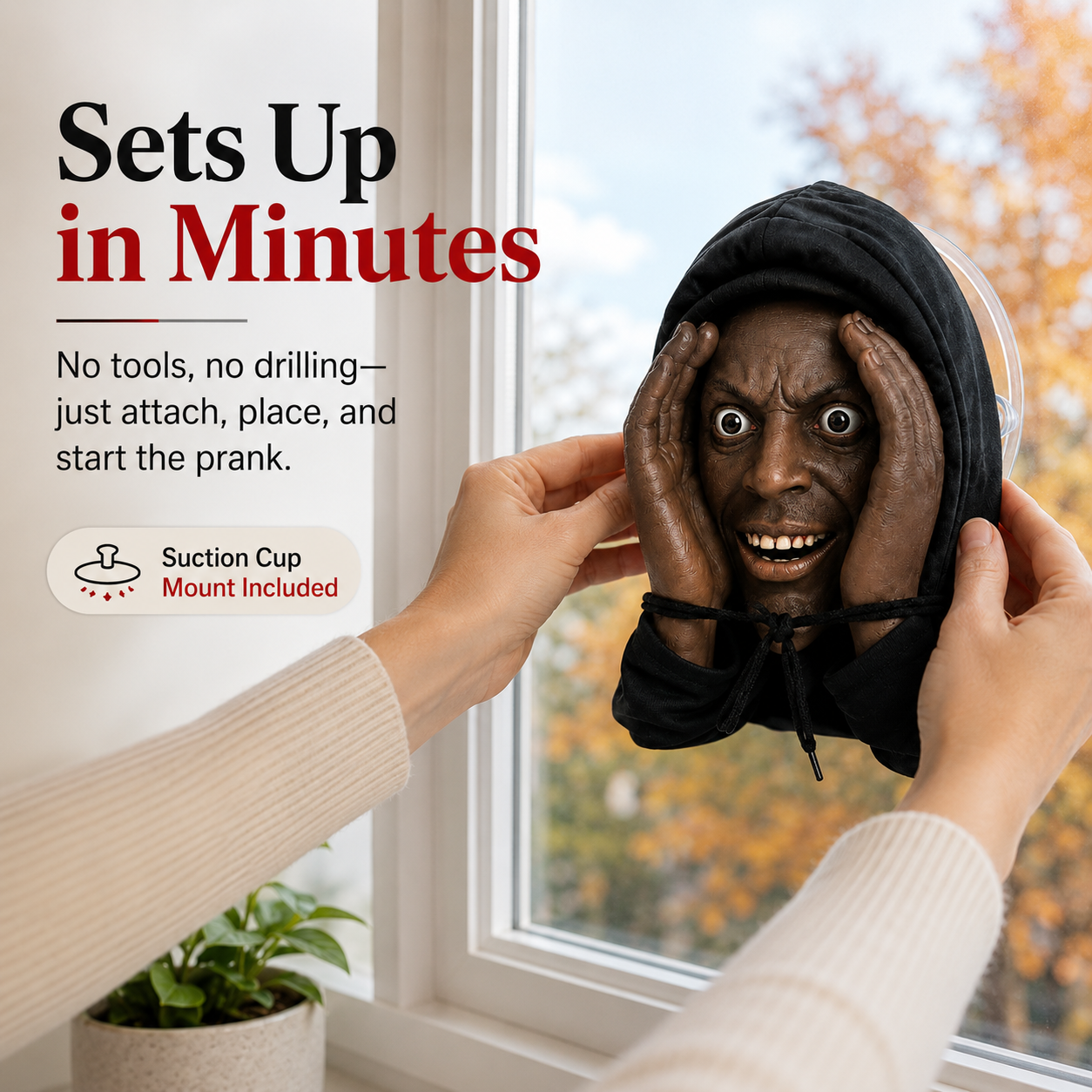 Installing creepy window prank decoration with suction cup