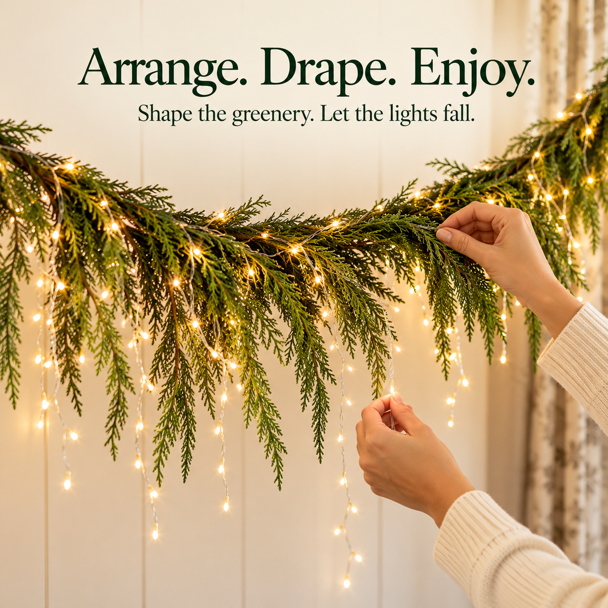 Elegant green garland styling with warm holiday lights