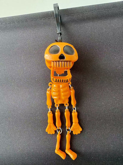 💀✨Pull-String Skeleton Keychain – Viral Funny Fidget Toy & Bag Charm