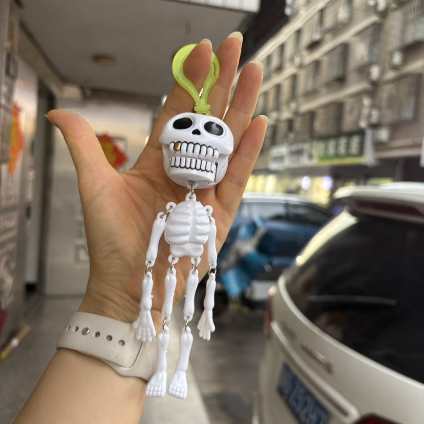 💀✨Pull-String Skeleton Keychain – Viral Funny Fidget Toy & Bag Charm