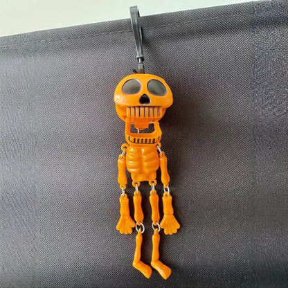 💀✨Pull-String Skeleton Keychain – Viral Funny Fidget Toy & Bag Charm