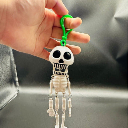 💀✨Pull-String Skeleton Keychain – Viral Funny Fidget Toy & Bag Charm