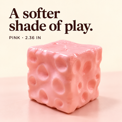 Pink cheese cube squishy fidget toy