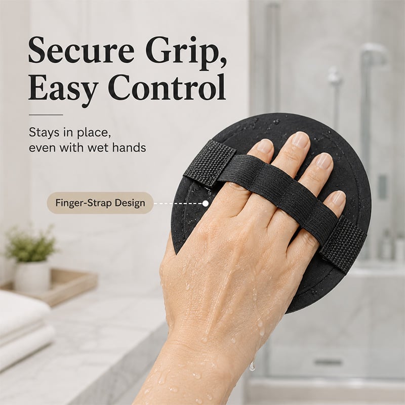Finger strap on exfoliating shower glove for easy grip