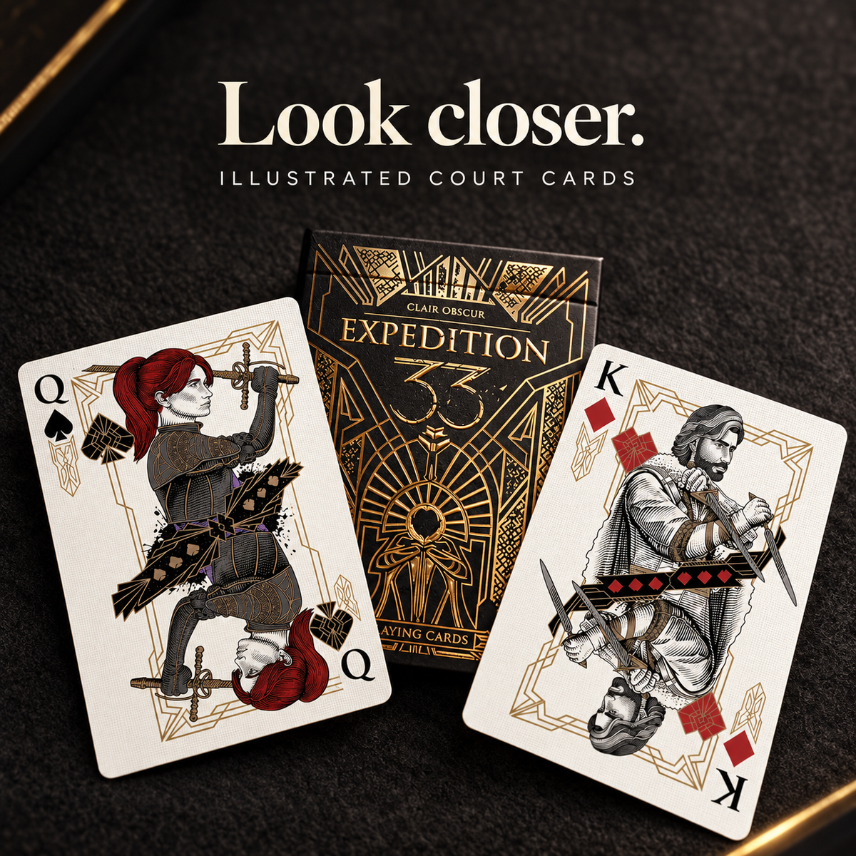 Illustrated queen and king cards beside the black gold tuck box