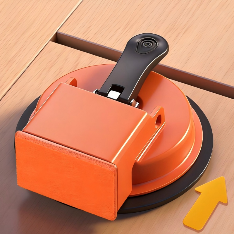 Floor gap fixer suction cup positioned beside a gap with arrow showing plank movement direction