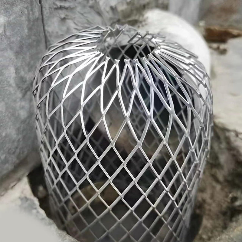 Close view of expandable metal mesh gutter outlet guard