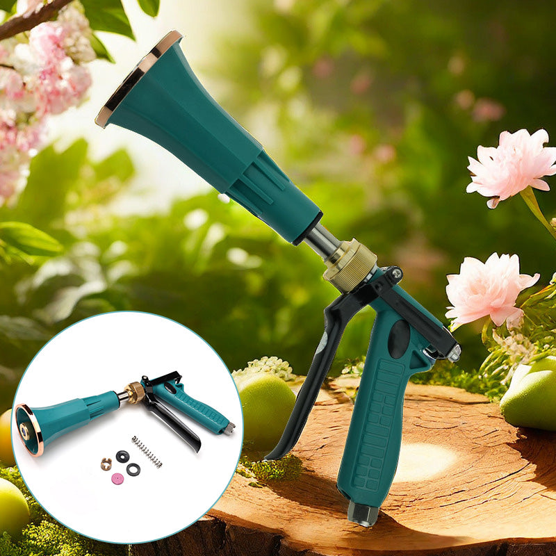 Adjustable agricultural spray gun with retractable shield in garden setting